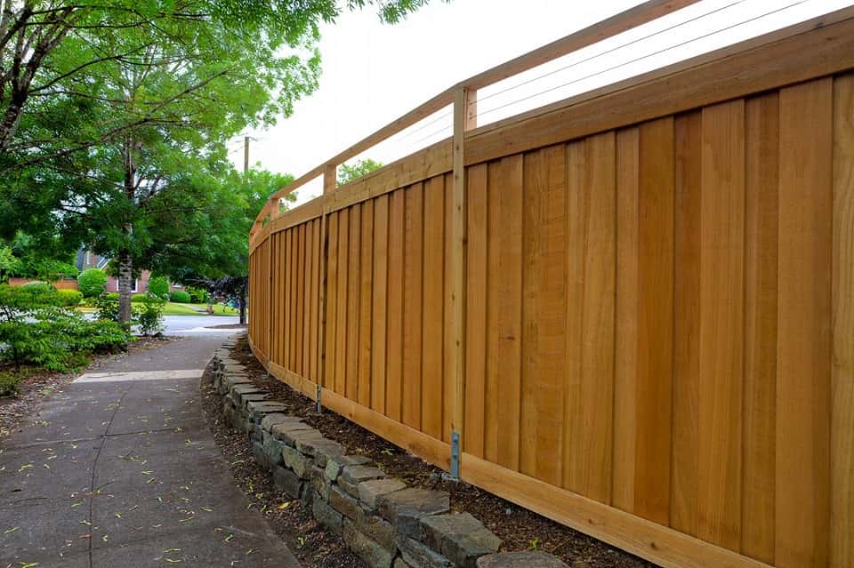 Residential fence line along a quiet street