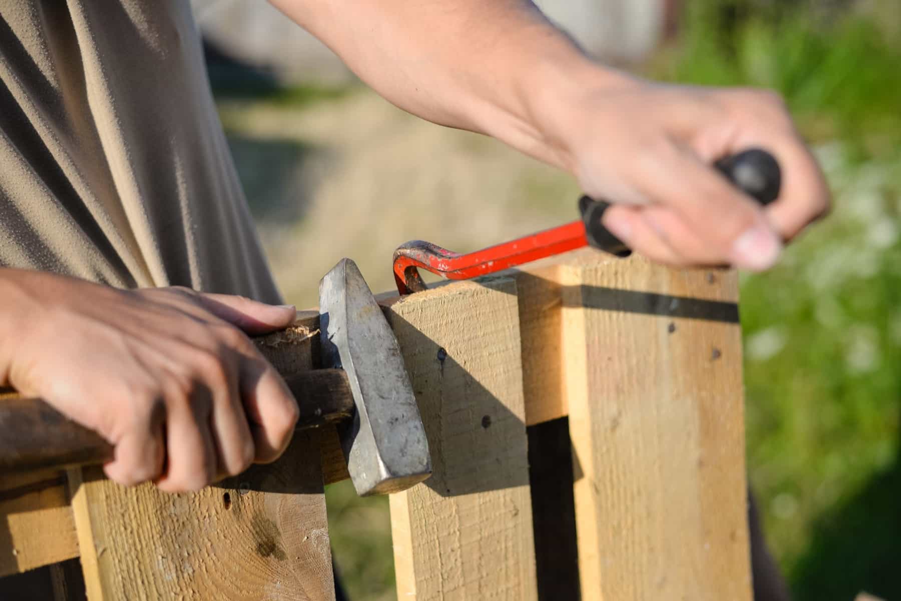 Fence repair work along a residential property