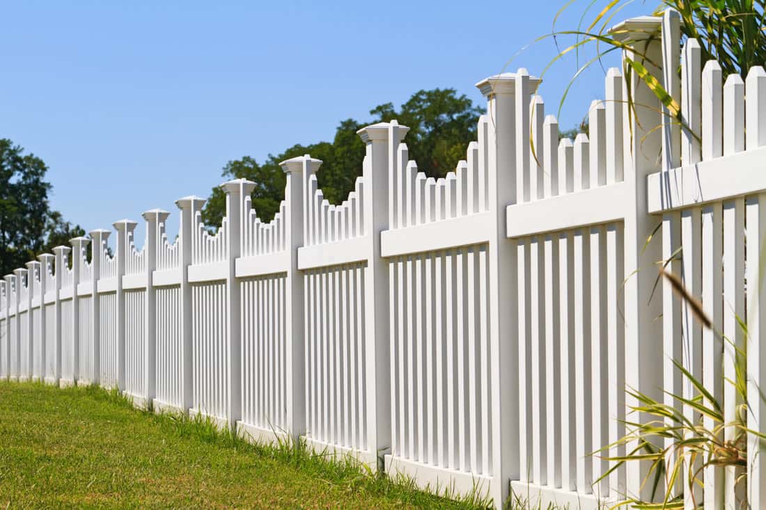 Vinyl fencing along an open residential lot